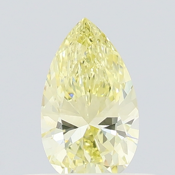 Actual 0.39 carat Fancy Intense Yellow Pear lab-grown diamond
